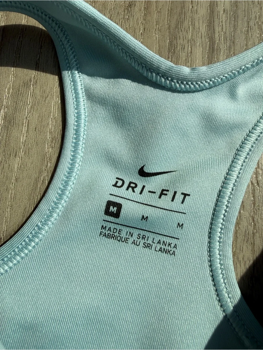 Nike Women’s Light Blue Racerback Sports BraTop